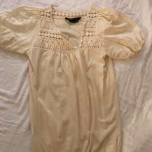BCBGMaxazria cream blouse with crocheted pattern